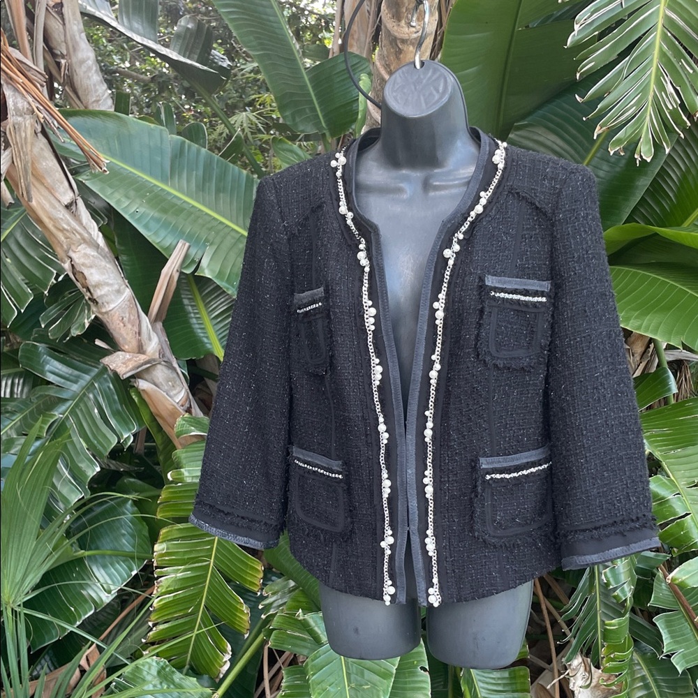 White House, black market chain and pearl trimmed tweed jacket